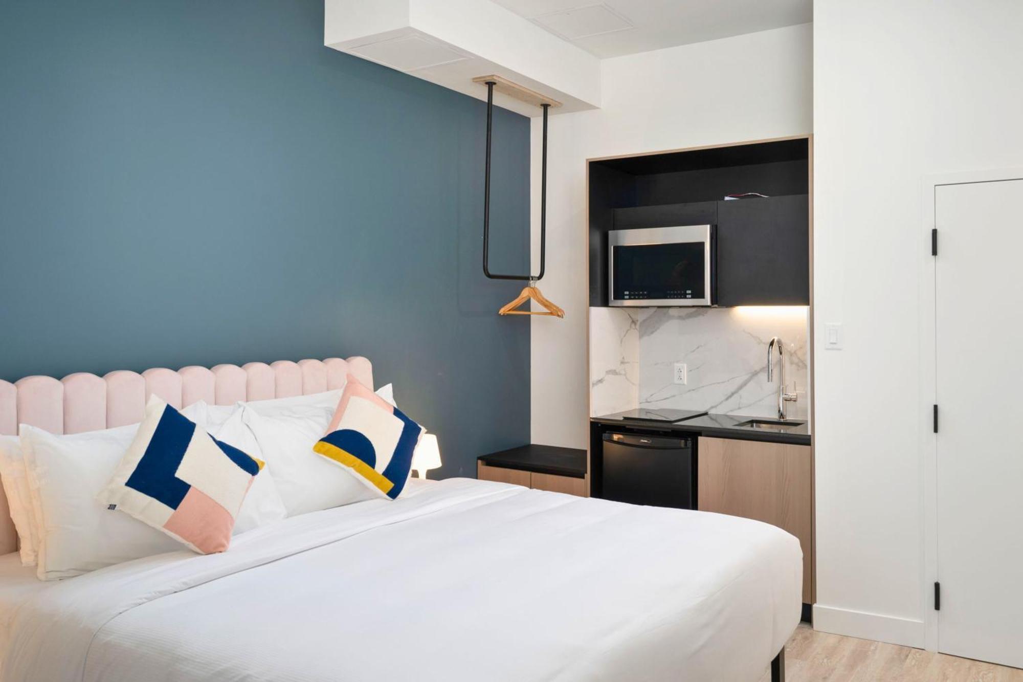 Hébergement Lit King-Size Premium